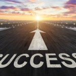 runway with arrow pointing to success